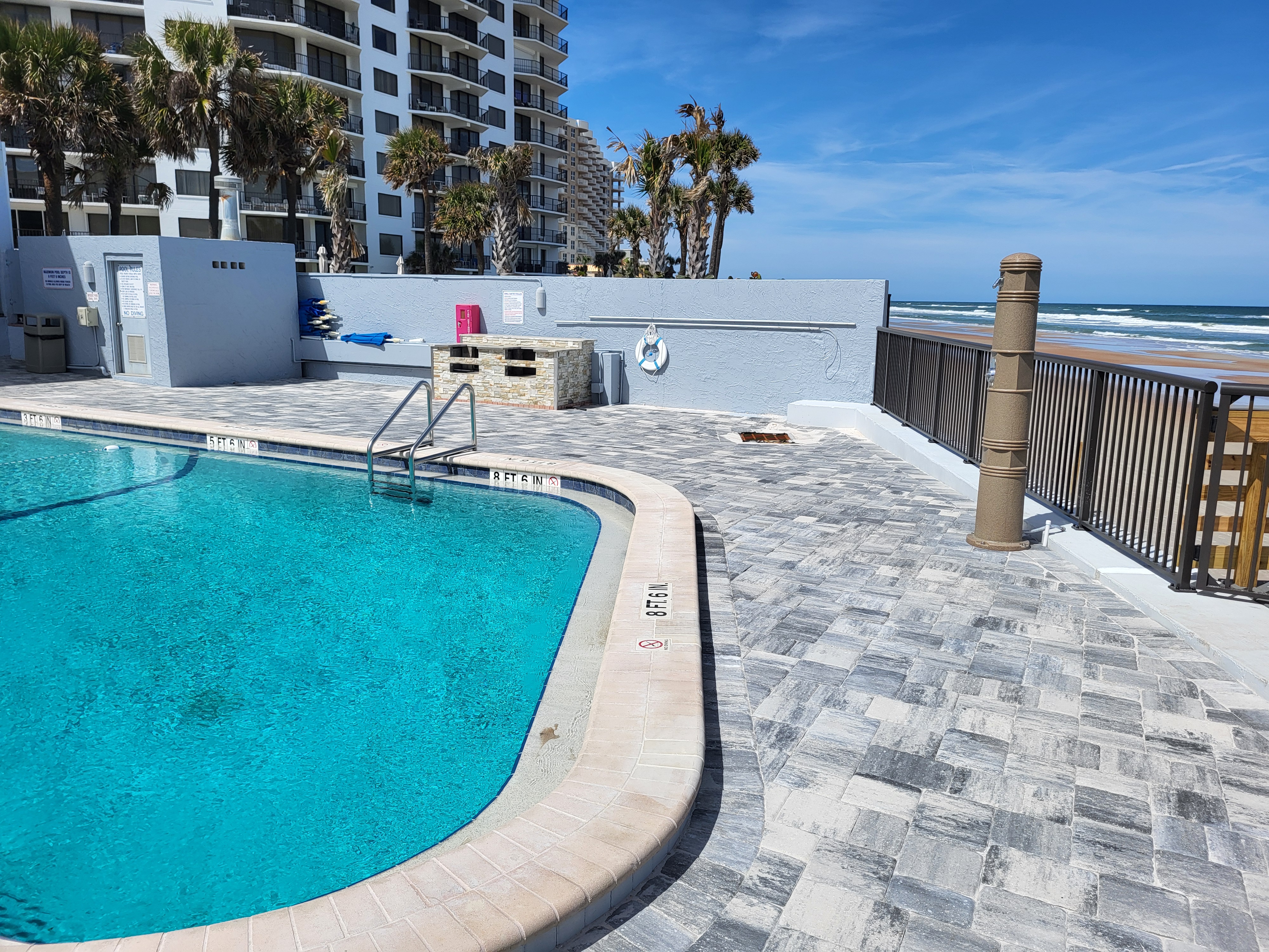 Our brand new pool, sea wall, and patio! Open and ready for you to enjoy!