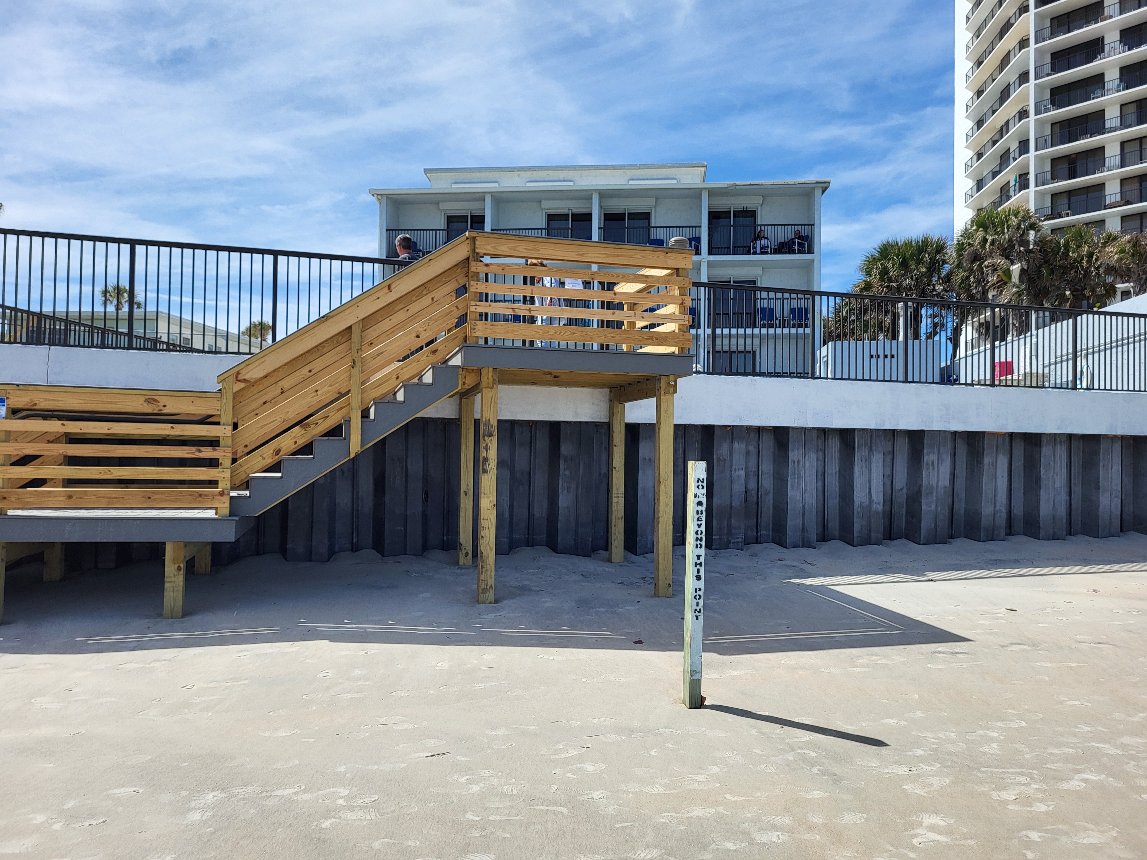 The replaced wooden steps as required by law.